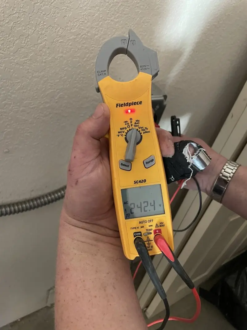 Voltage testing with clamp meter during Electrical Installation Services in Jensen Beach